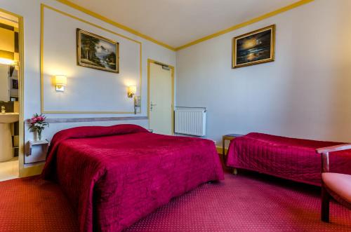 Habitación cuádruple del hotel Avenir Montmartre. Foto 1