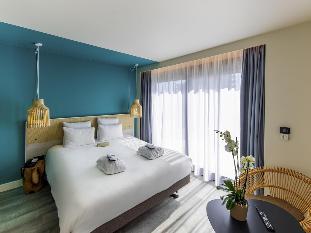 Suite familiar, 1 cama de matrimonio grande con sofá cama (Riviera) del hotel Novotel Monte Carlo. Foto 1