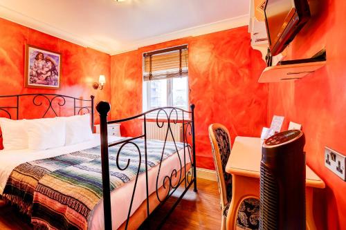 Habitación Deluxe Triple Familiar con Baño del hotel Church Street. Foto 3