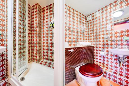 Habitación Deluxe Triple Familiar con Baño del hotel Church Street. Foto 5