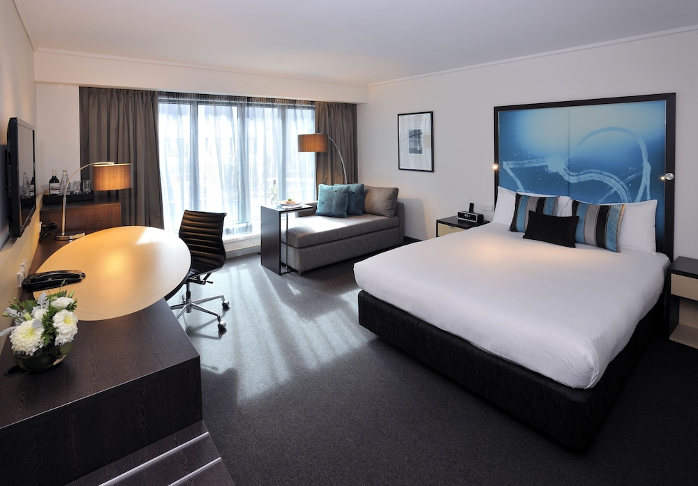 Habitación Deluxe 1 Cama King del hotel Novotel Melbourne On Collins. Foto 1