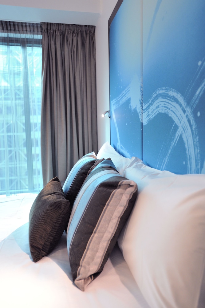 Habitación Deluxe 2 Camas Dobles del hotel Novotel Melbourne On Collins. Foto 1