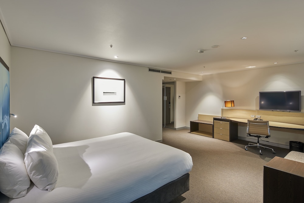 Habitación Accesible 1 Cama King del hotel Novotel Melbourne On Collins. Foto 1
