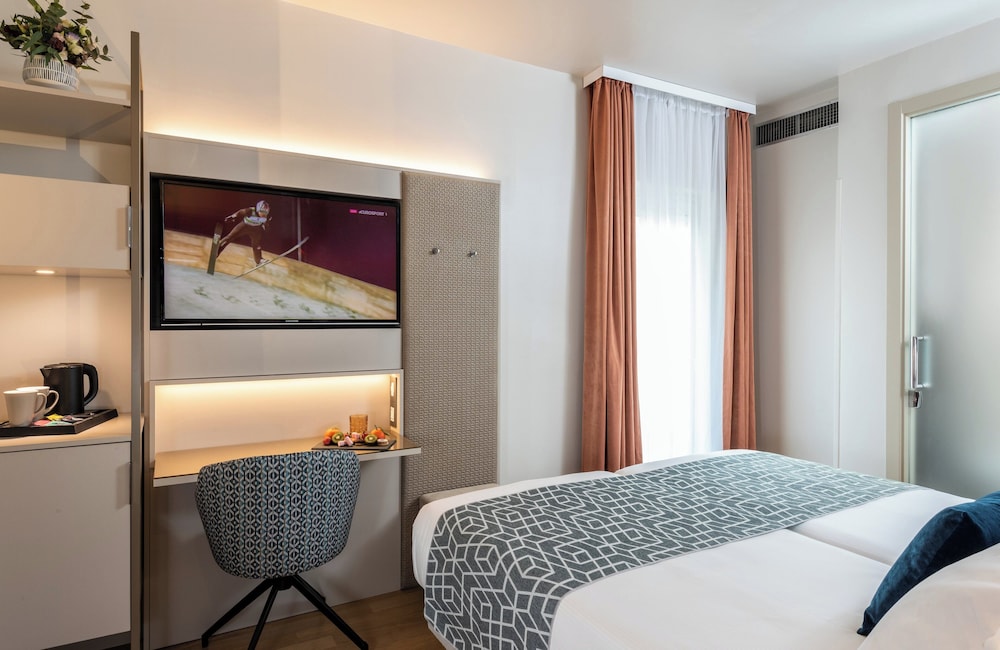 Habitación Confort del hotel Leonardo Boutique Rome Termini. Foto 7