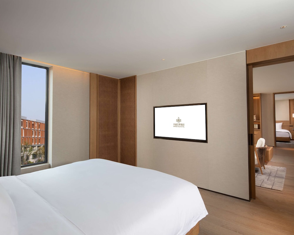 Suite Residencia con 1 Cama King del hotel Grand WUJI, in The Unbound Collection by Hyatt. Foto 1