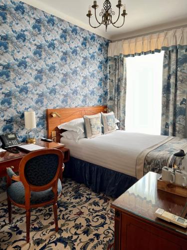 Habitación Doble Petite del hotel London Lodge. Foto 1