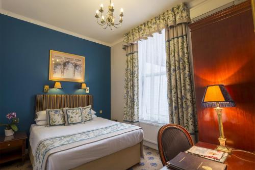 Habitación Doble Superior del hotel London Lodge. Foto 2