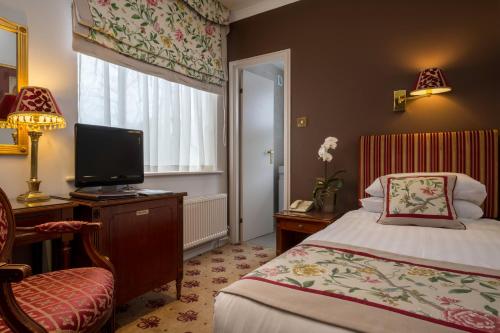 Habitación Individual Superior del hotel London Lodge. Foto 1