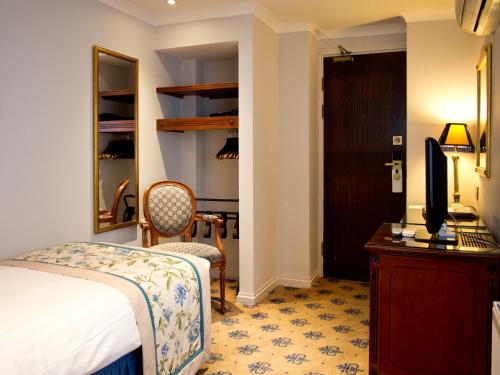 Habitación Individual Superior del hotel London Lodge. Foto 13