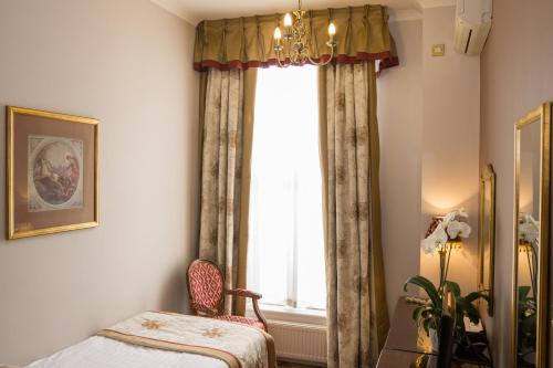Habitación Individual Superior del hotel London Lodge. Foto 14