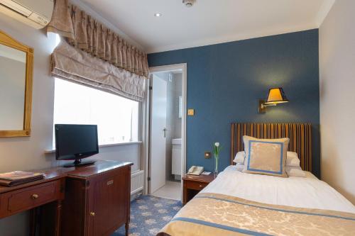 Habitación Individual Superior del hotel London Lodge. Foto 17