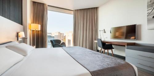 Habitación Doble - 1 o 2 camas del hotel Ilunion Atrium. Foto 2