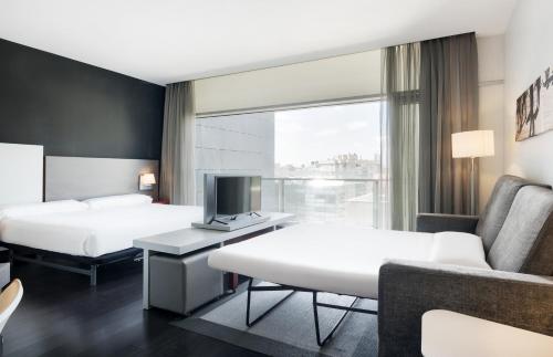 Habitación Familiar del hotel Ilunion Atrium. Foto 1