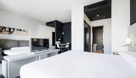 Habitación familiar del hotel Ilunion Atrium. Foto 4