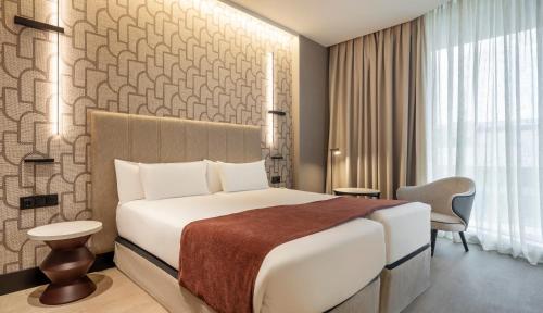 Habitación Doble Deluxe del hotel Ilunion Atrium