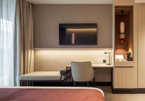 Habitación Doble Deluxe del hotel Ilunion Atrium. Foto 3