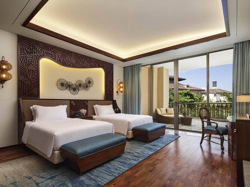Fairmont Gold, Habitación, 2 camas individuales, Acceso al salón del club, vistas al jardín del hotel Fairmont Sanya Haitang Bay. Foto 3