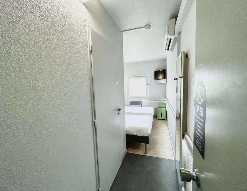Habitación doble Vista Jardín 2 Camas individuales del hotel ibis budget Beaune. Foto 7