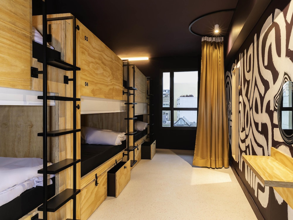 1 Lit dans une chambre partagée de 6 réservée aux femmes del hotel JO&JOE Paris - Nation. Foto 7