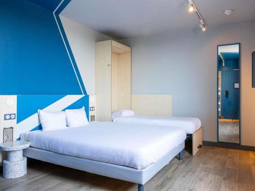Habitación Standard accesible con 1 cama doble y 1 cama individual del hotel Ibis Budget Toulouse Labège