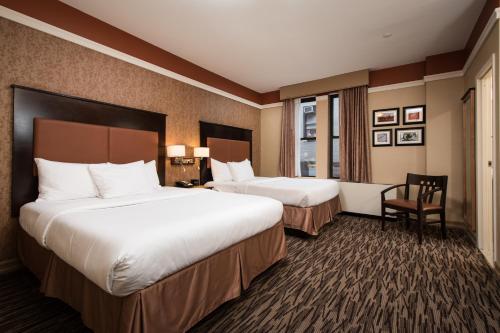 Habitación Doble del hotel The Hotel @ Fifth Avenue. Foto 2