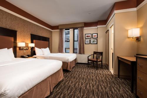 Habitación Doble Deluxe del hotel The Hotel @ Fifth Avenue. Foto 5