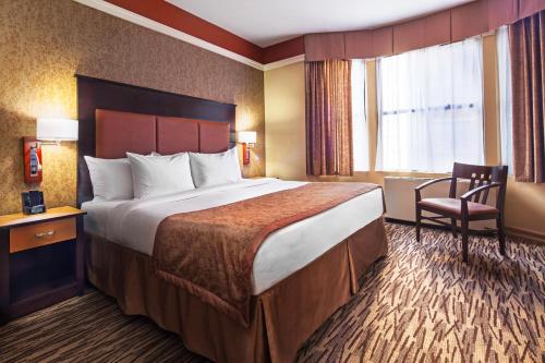 Habitación Deluxe con cama extragrande del hotel The Hotel @ Fifth Avenue. Foto 10