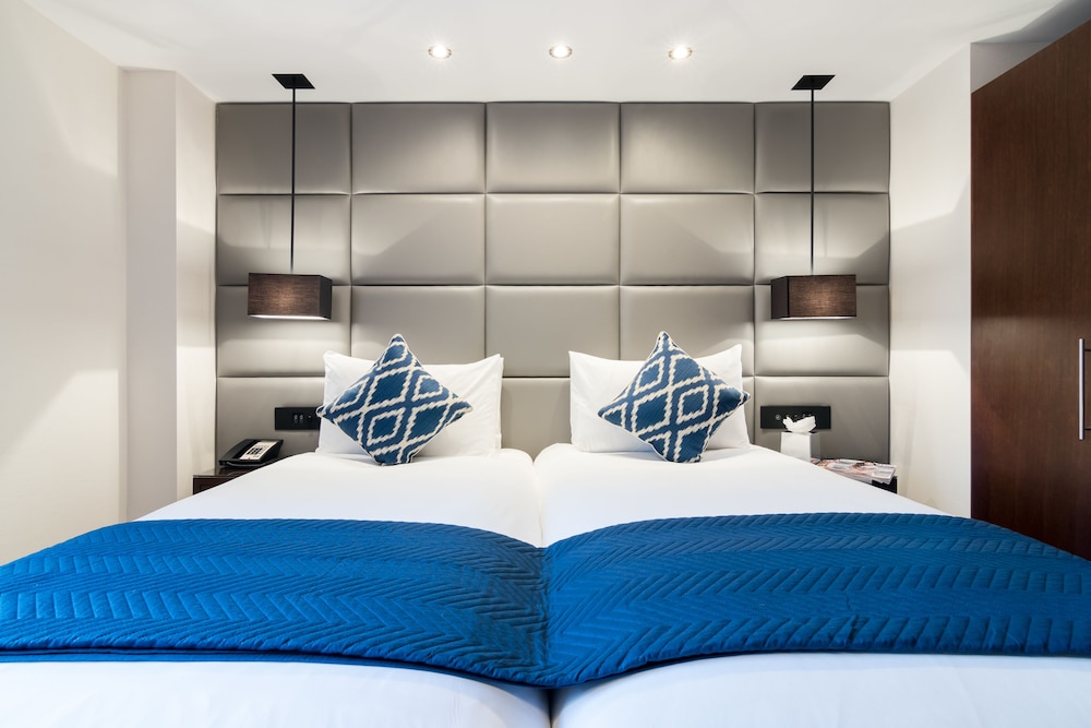 Habitación Deluxe con 2 camas individuales del hotel Montcalm Chilworth Townhouse, Paddington. Foto 3