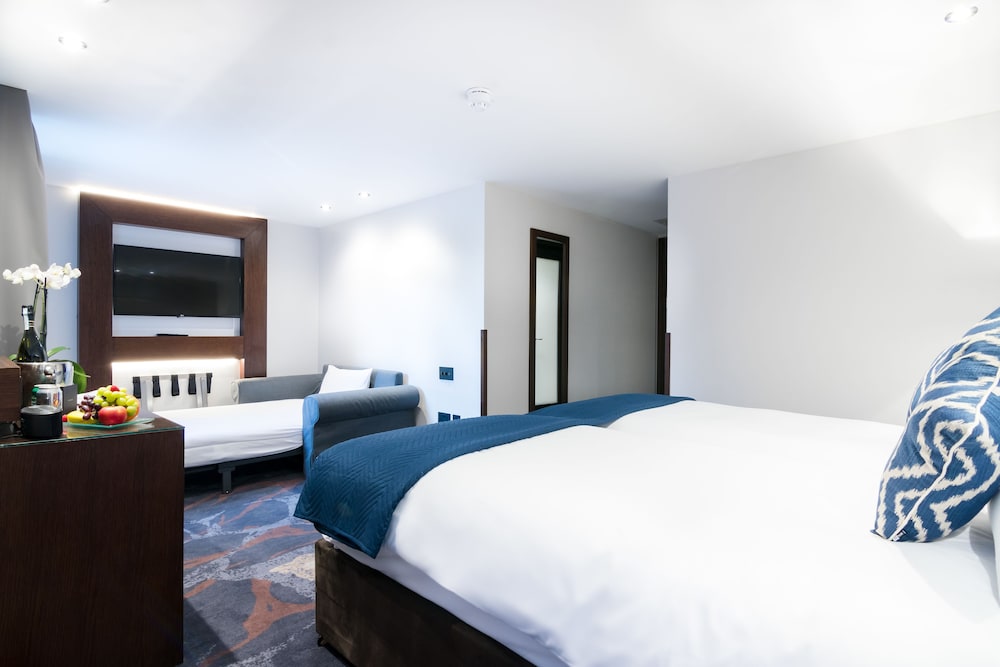 Habitación triple Deluxe del hotel Montcalm Chilworth Townhouse, Paddington. Foto 4