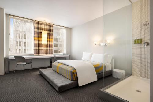 Habitación Select con cama grande del hotel The Delphi. Foto 3