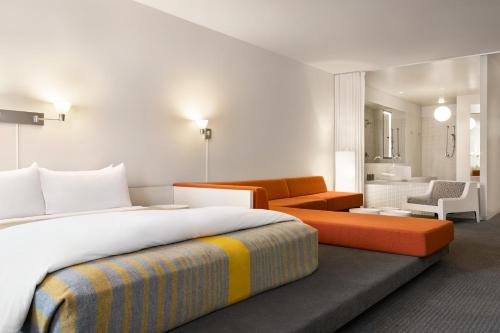 Suite Delphi con cama extragrande del hotel The Delphi. Foto 3