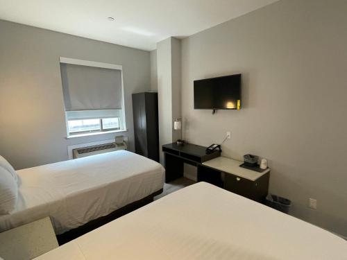 Habitación Doble Deluxe del hotel King Brooklyn Sunset Park. Foto 1
