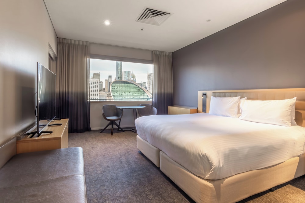 SUITE EJECUTIVA, 1 CAMA QUEEN del hotel Novotel Sydney On Darling Harbour. Foto 1