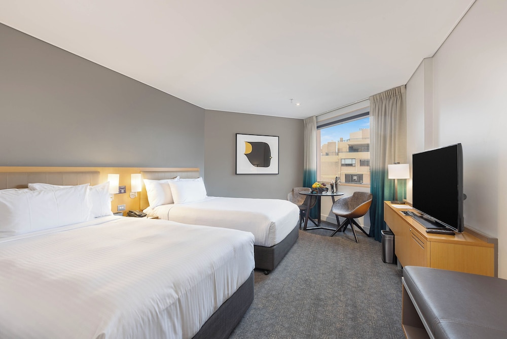 Habitación superior, 2 camas dobles del hotel Novotel Sydney On Darling Harbour. Foto 1