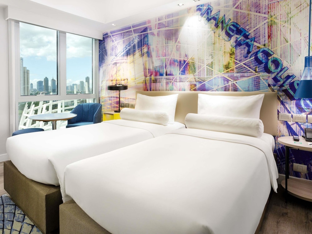 Habitación Standard con dos camas individuales del hotel Ibis Styles Manila Araneta City