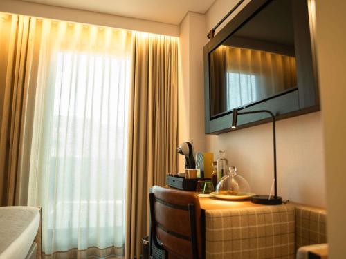 Premium Room with Terrace del hotel Ibis Styles Lisboa Aeroporto. Foto 3