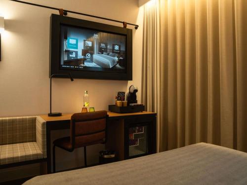 Habitación Estandar del hotel Ibis Styles Lisboa Aeroporto. Foto 1
