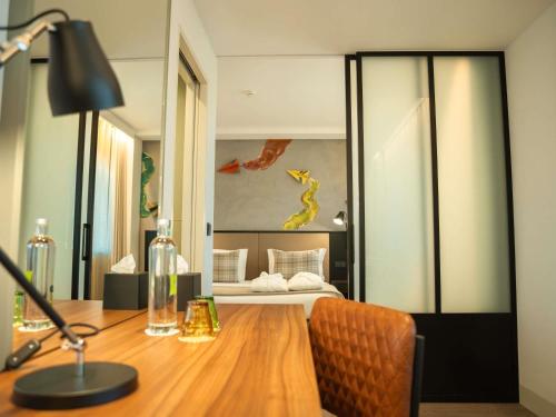 Suite Deluxe del hotel Ibis Styles Lisboa Aeroporto. Foto 4