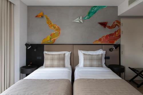 Habitación Doble Superior - 2 camas del hotel Ibis Styles Lisboa Aeroporto. Foto 3