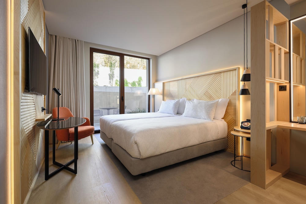 INNSiDE Room con Terraza Vista jardín del hotel Innside By Meliá Braga Centro. Foto 3