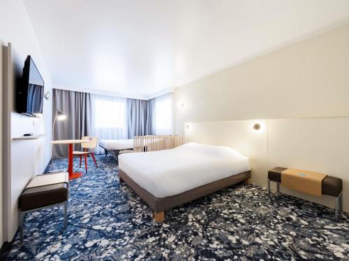 Pop Double Room with Double Sofa Bed del hotel Greet Paris 13 Porte D'Italie. Foto 4