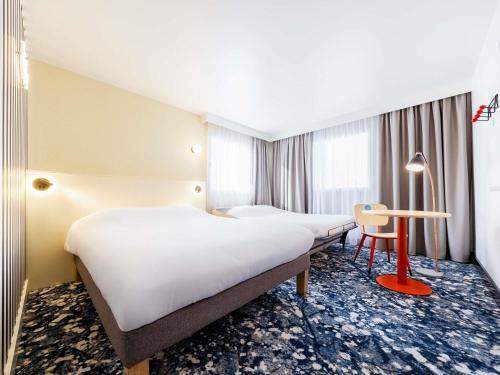 Pop Double Room with Double Sofa Bed del hotel Greet Paris 13 Porte D'Italie. Foto 10