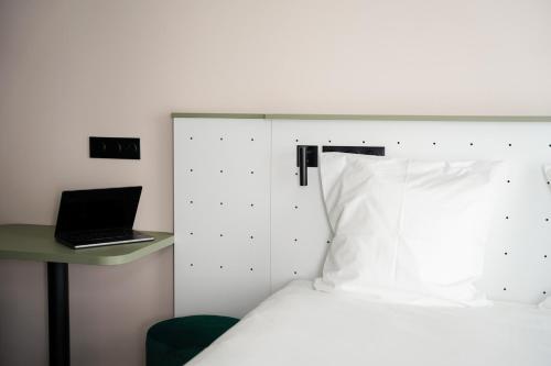 Estudio Confort grande (cama individual y cama nido) del hotel and hotel All Suites Paris 13 Porte d'Italie. Foto 3