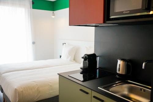 Estudio Confort - Camas individuales del hotel and hotel All Suites Paris 13 Porte d'Italie. Foto 2