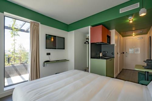 Estudio Confort (cama doble) del hotel and hotel All Suites Paris 13 Porte d'Italie. Foto 3