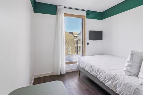 Habitación Estándar con cama individual del hotel and hotel All Suites Paris 13 Porte d'Italie. Foto 4
