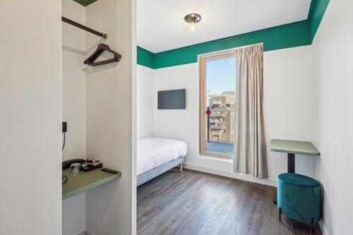 Habitación Estándar con cama individual del hotel and hotel All Suites Paris 13 Porte d'Italie. Foto 5