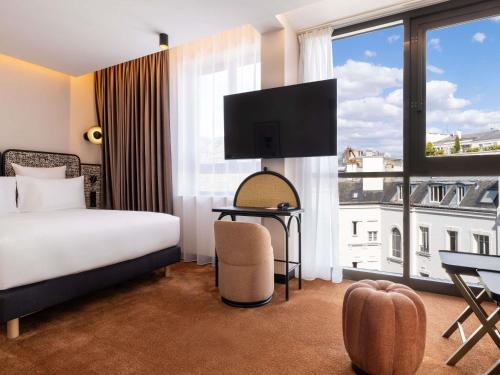 Suite Junior con sofá cama - 1 cama doble del hotel Maison Hamelin Paris - Handwritten Collection