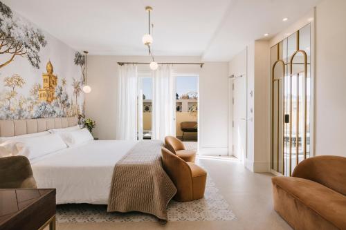 Habitación Doble Premium con terraza del hotel MASANET Emblematic Adults Only. Foto 6