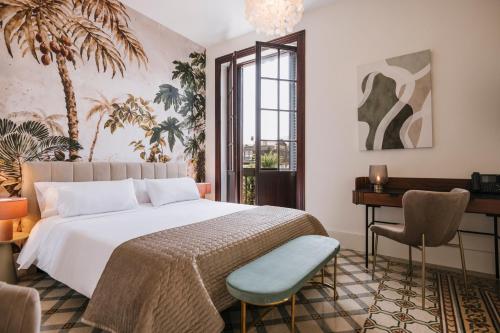 Habitación Doble Deluxe con balcón del hotel MASANET Emblematic Adults Only. Foto 1